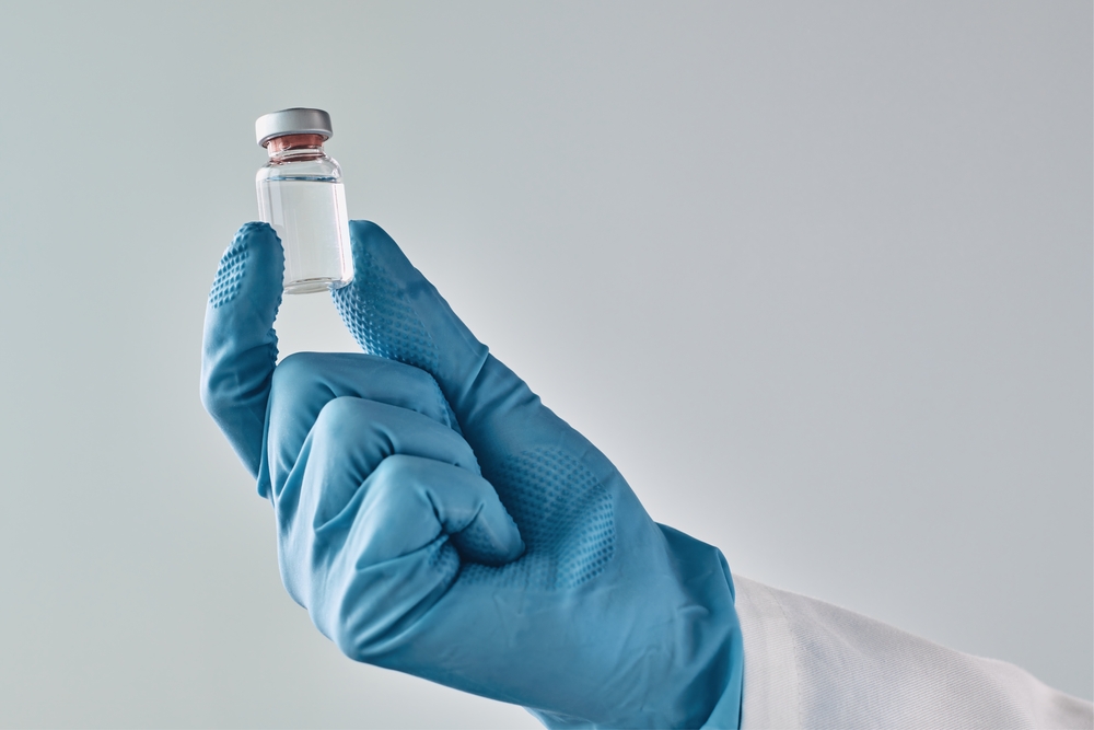 Doctor Holding Vaccine